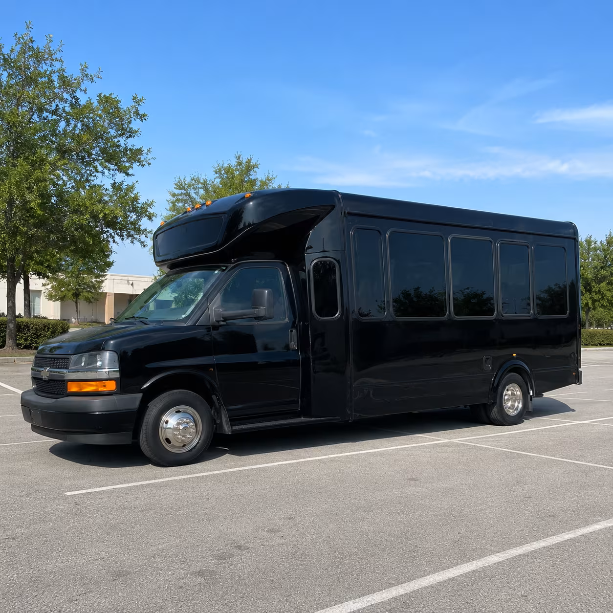 Group beside a Mercedes Sprinter limo in Oklahoma City